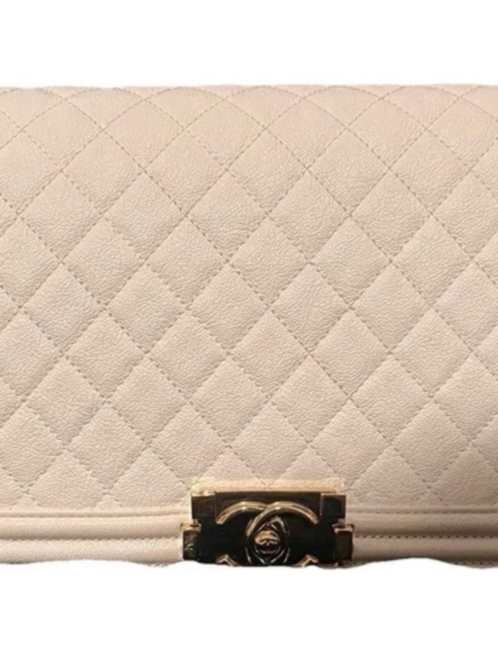 Chanel boy bag in light cream with gold hardware
